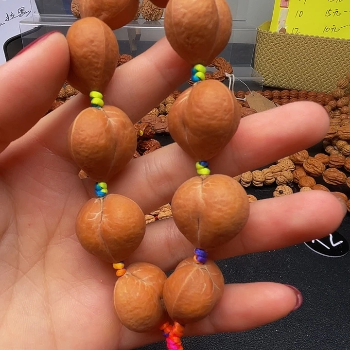 宝***丁文玩核桃手串屁桃
