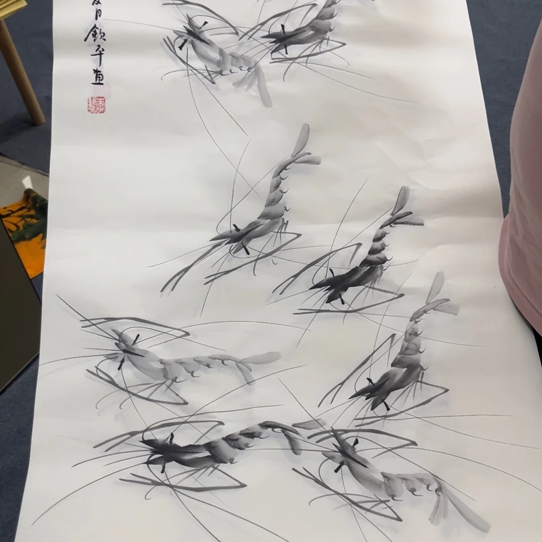 国画卖字画的小男孩