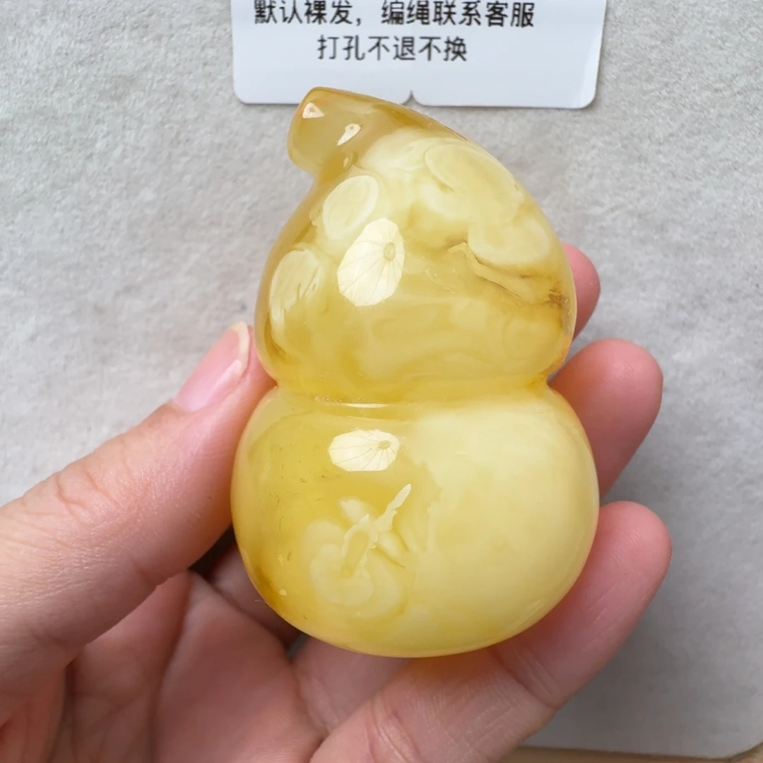 蜜蜡未镶嵌珠宝奇石超过七天不退不换，有瑕疵