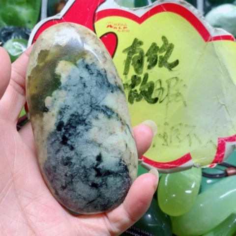 未镶嵌蛇纹石玉手把件