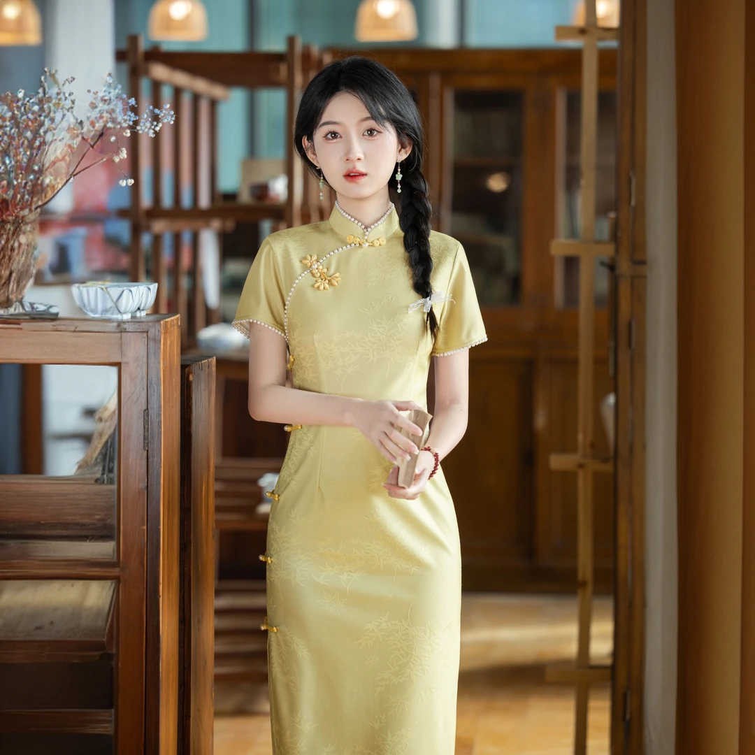 黄色旗袍新款改良少女夏季年轻款古法长款连衣裙