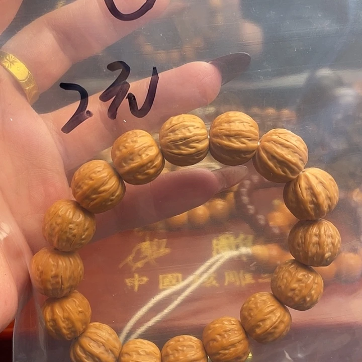 橄榄核吊坠盛****及猴头手串