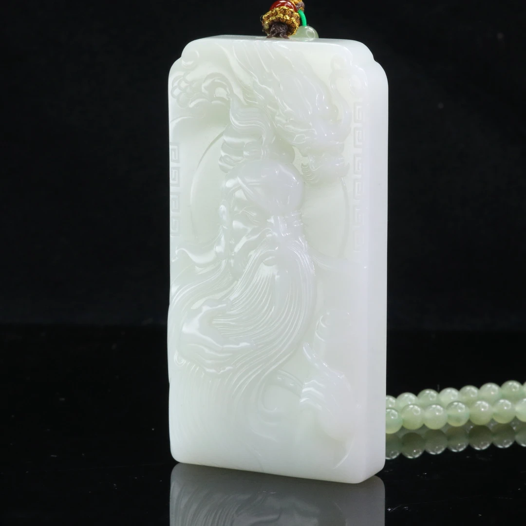 25和田玉羊脂白玉关公（钟文杰作）/000691上海嘉禾拍卖