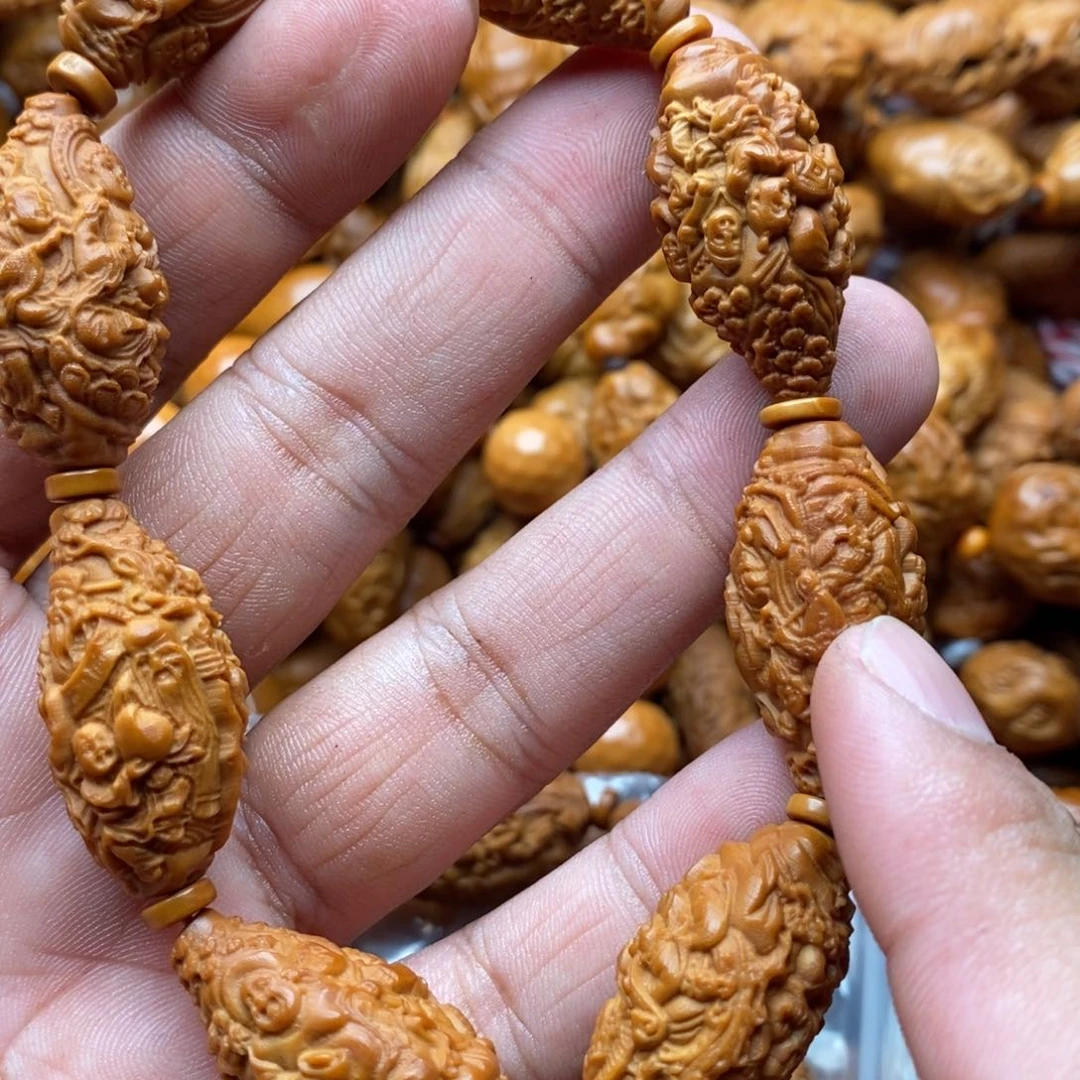 橄榄核吊坠钱钱钱