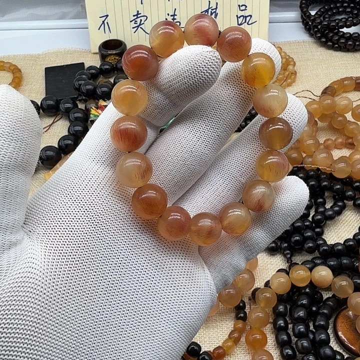 一***梹木质类驴蹄子纯蜜血料手串