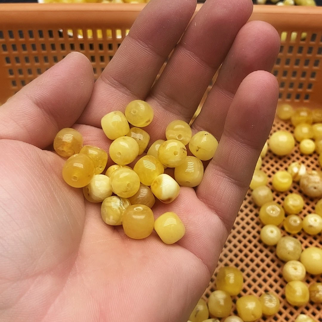 蜜蜡未镶嵌珠宝奇石10毫米老型有坑有裂随机一颗