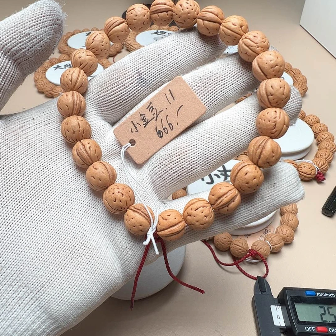 用***0桃核手串1.1小金豆精品