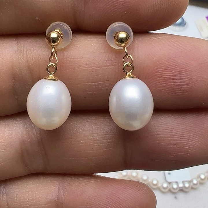 轻***～耳饰银S925镶嵌淡水珍珠风在吹耳饰