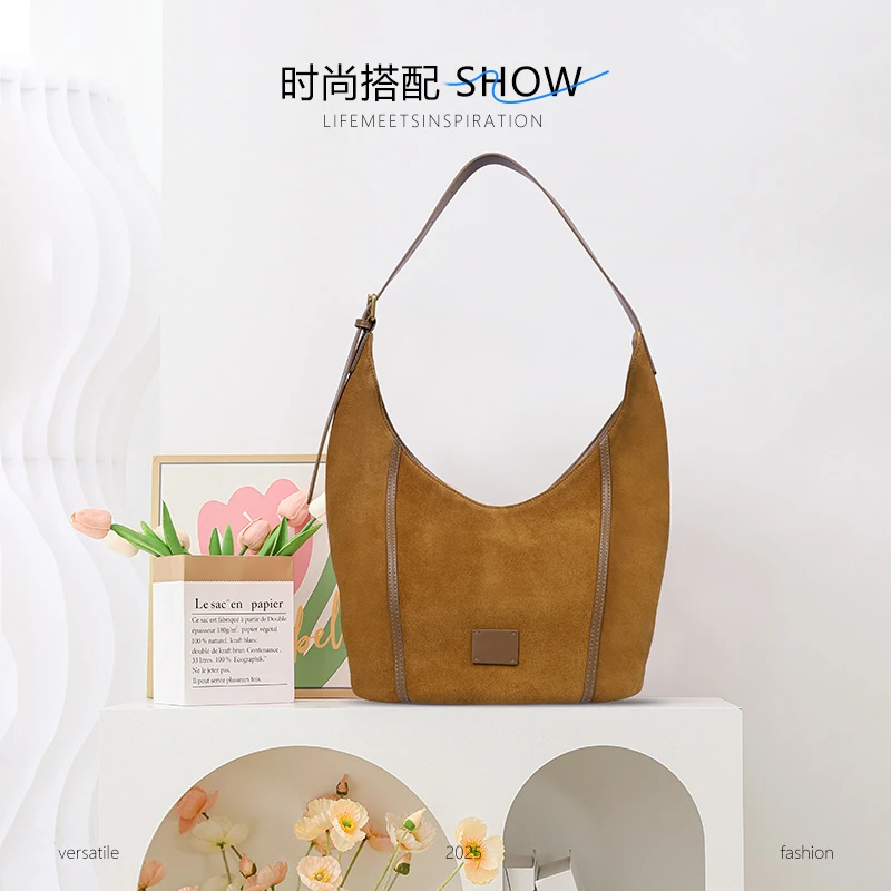 URMO包包2025新款爆款小众复古hobo包女秋冬通勤大容量手提托特包