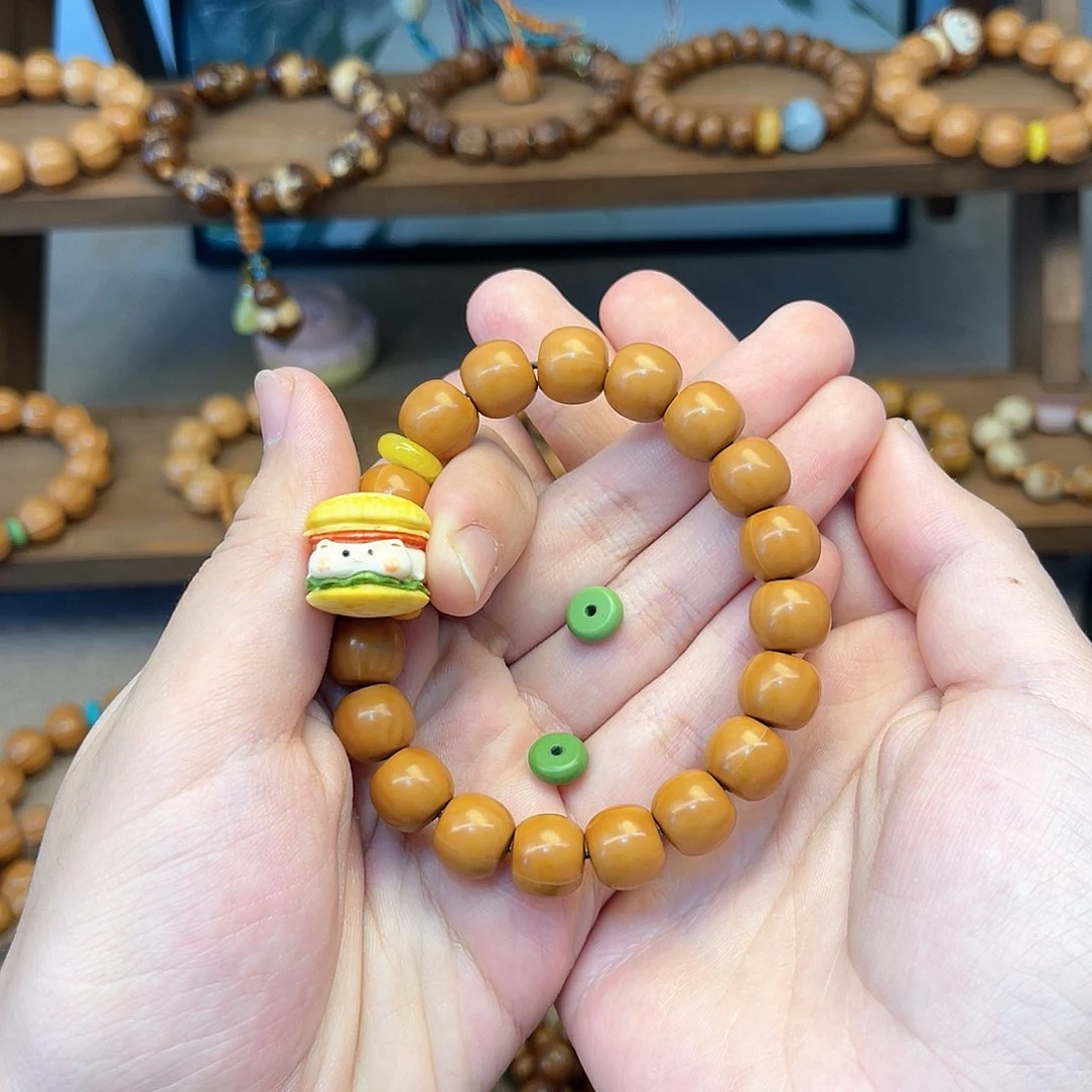 猴头核桃手串俗****气老型搭配汉堡两个绿隔片