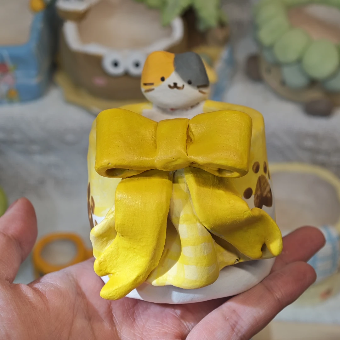 蝴蝶结黄色猫咪花盆