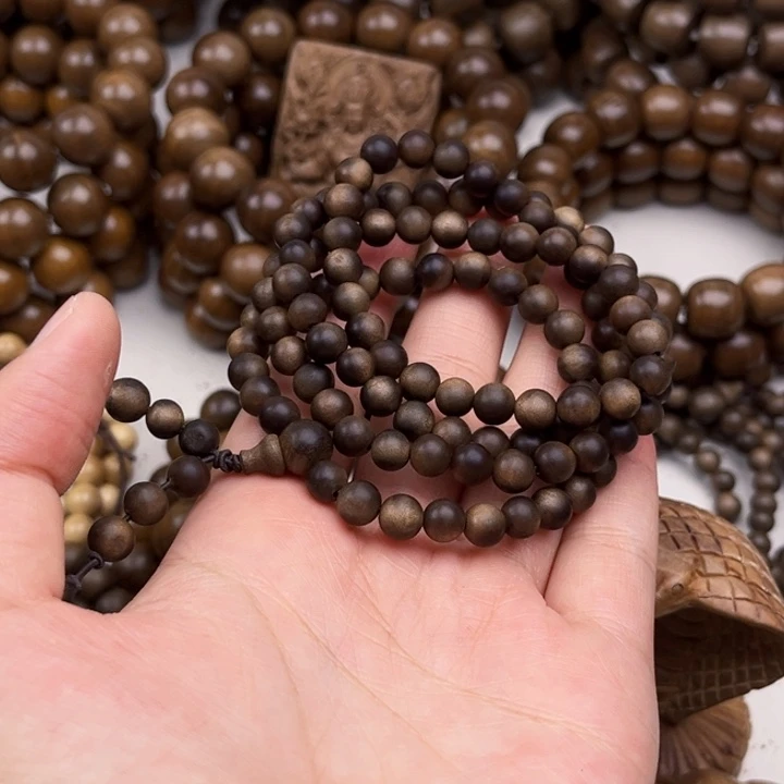 呵***娘檀香木手串/手链0.6