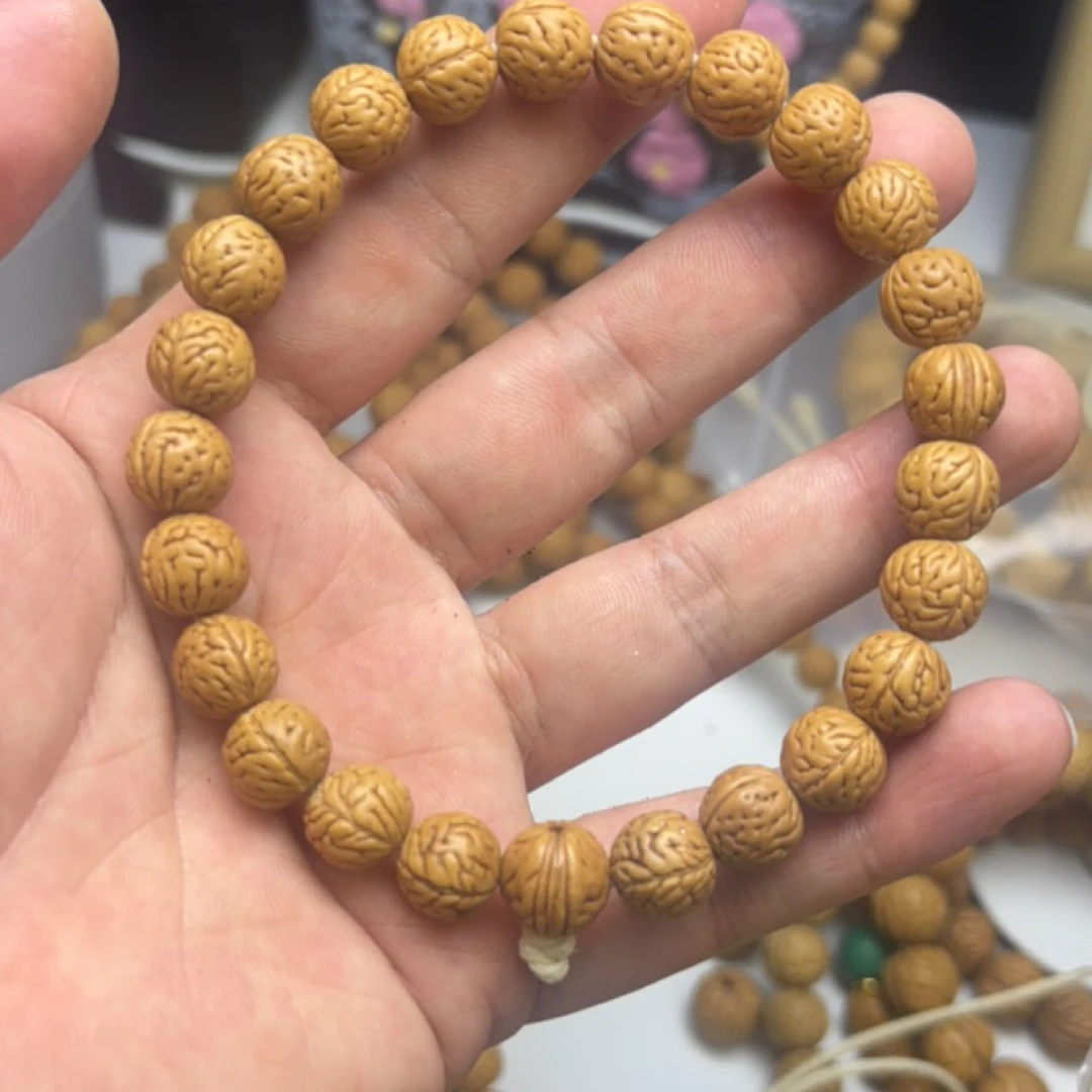 10小肠纹野生桃核手串 原皮原色