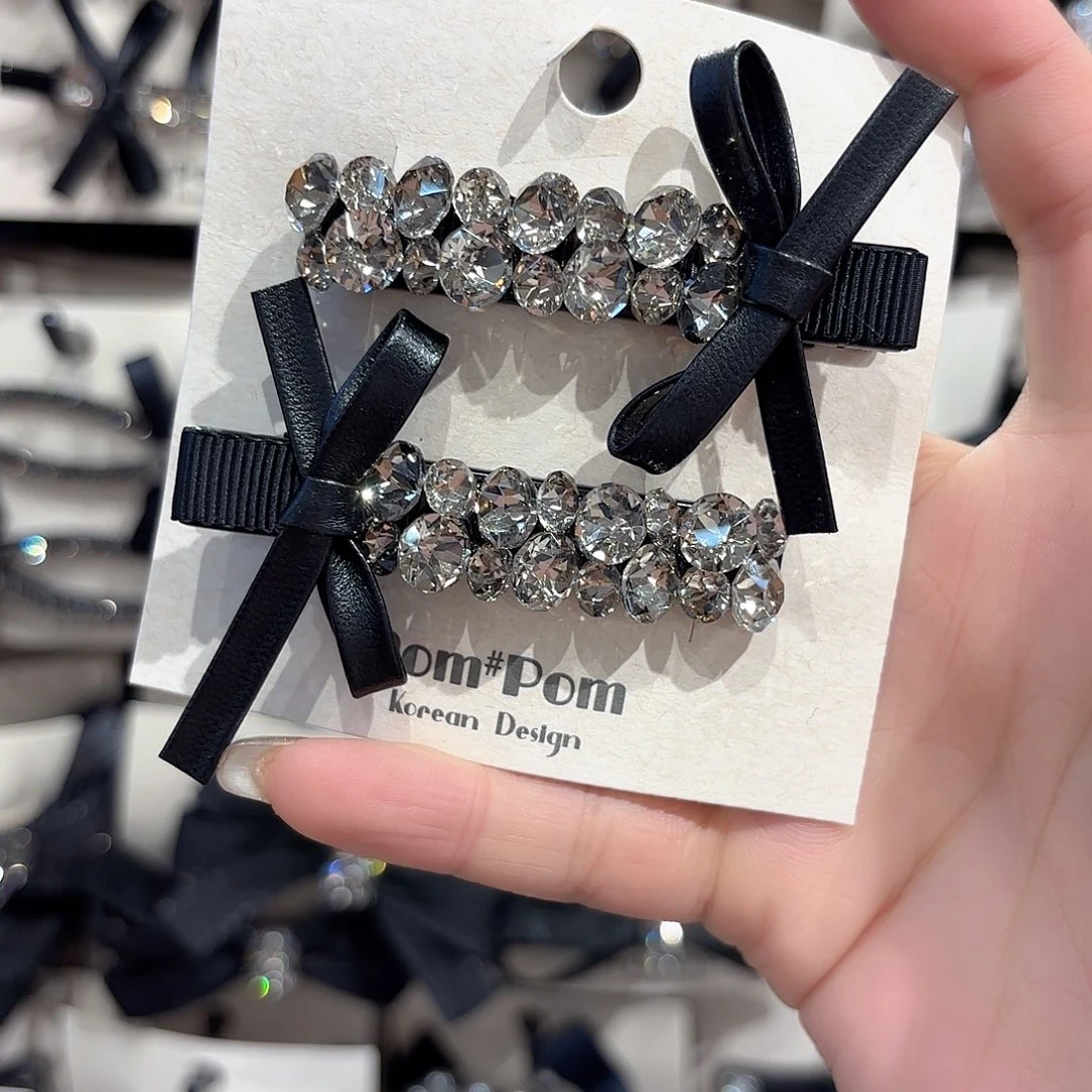 皮质铁合金黑色蝴蝶结压夹