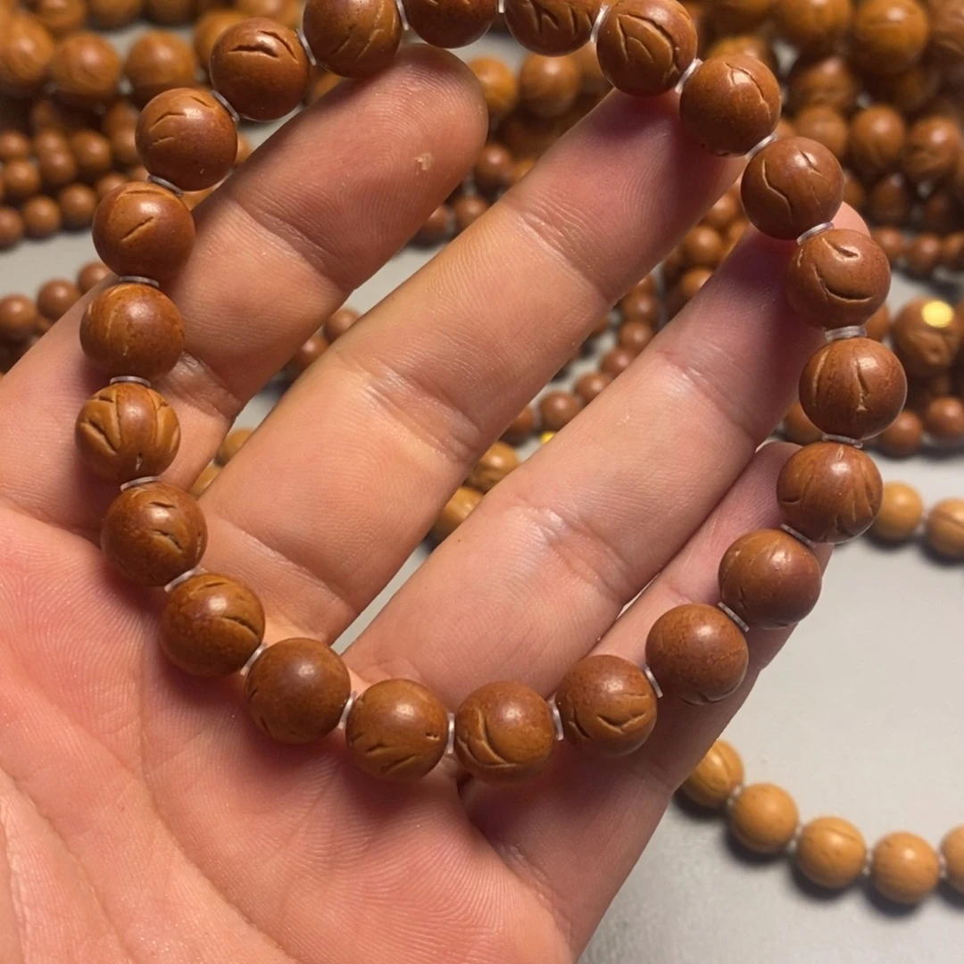 手串桃核龙纹光珠10.5