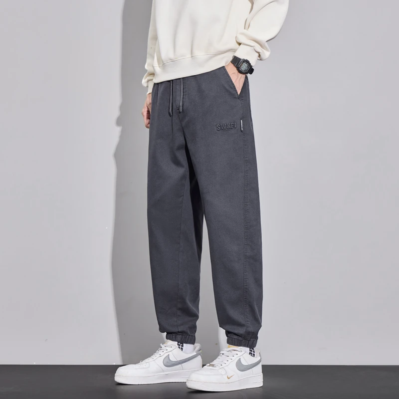 2025秋季新款仿牛面料宽松束脚休闲裤简约百搭舒适休闲束脚裤男潮