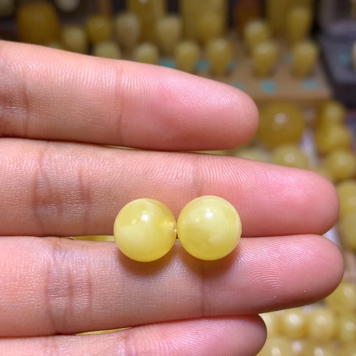 未镶嵌蜜蜡裸石天然俄料黄白溶洞妖花圆珠10.6