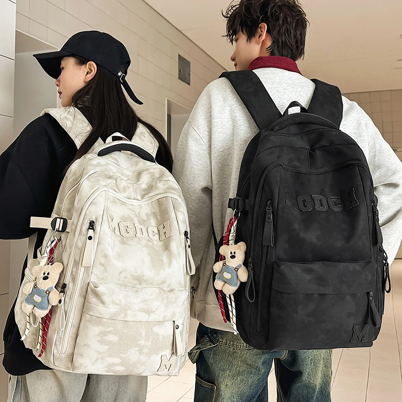 减负护脊大容量书包男款高中生初中女生双肩包大学生户外旅行背包