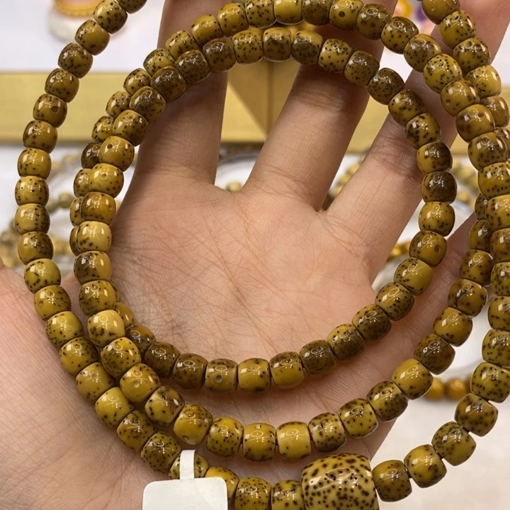 星月菩提吊坠7x6石玉燕麦黄正月大留白直切108