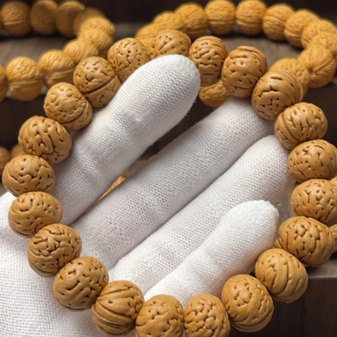 桃核手串8****伙树王纽扣