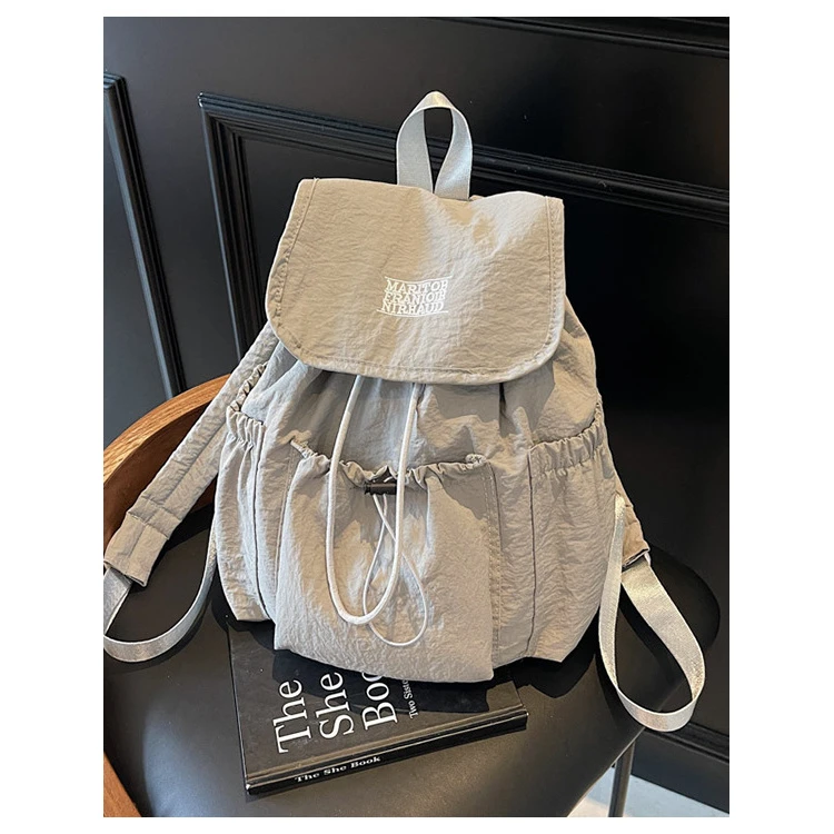 新款背包小众设计尼龙旅行书包抽绳户外大容量休闲轻便双肩包