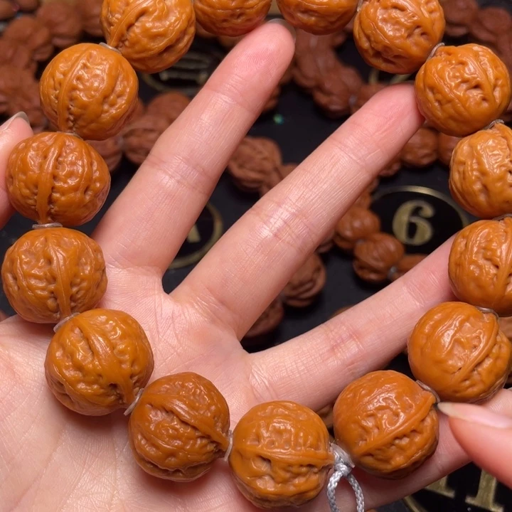 天***影文玩核桃把件粗筋光头