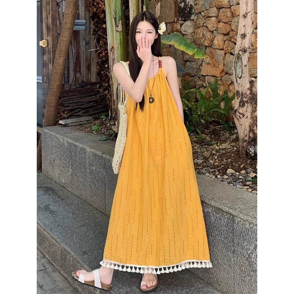 波西米亚黄色吊带连衣裙女夏大理云南旅游海边度假多巴胺沙滩长裙