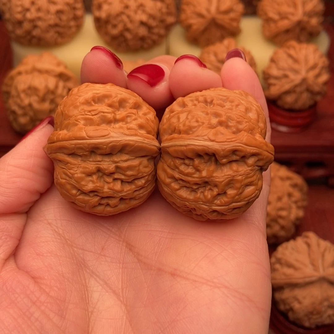 桃核把件拔***然平谷粗筋元宝37