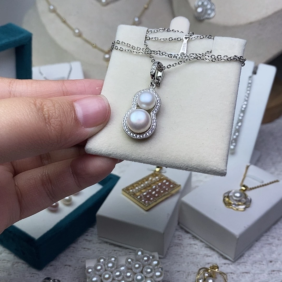 淡水珍珠银S925镶嵌耳饰