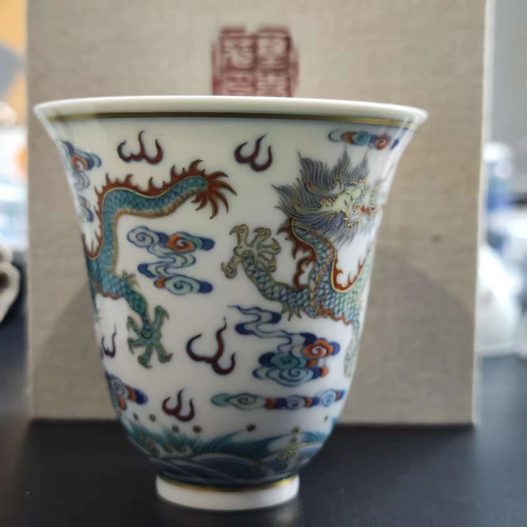 T49涂杏花描金双龙出海杯