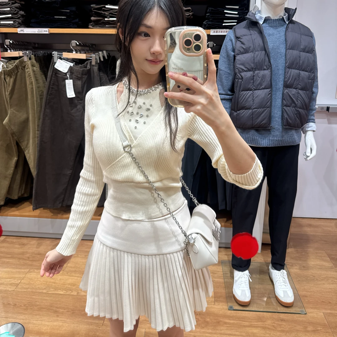 美式辣妹毛呢半身裙女秋冬新款通勤白色百褶裙高腰显瘦a字短裙子