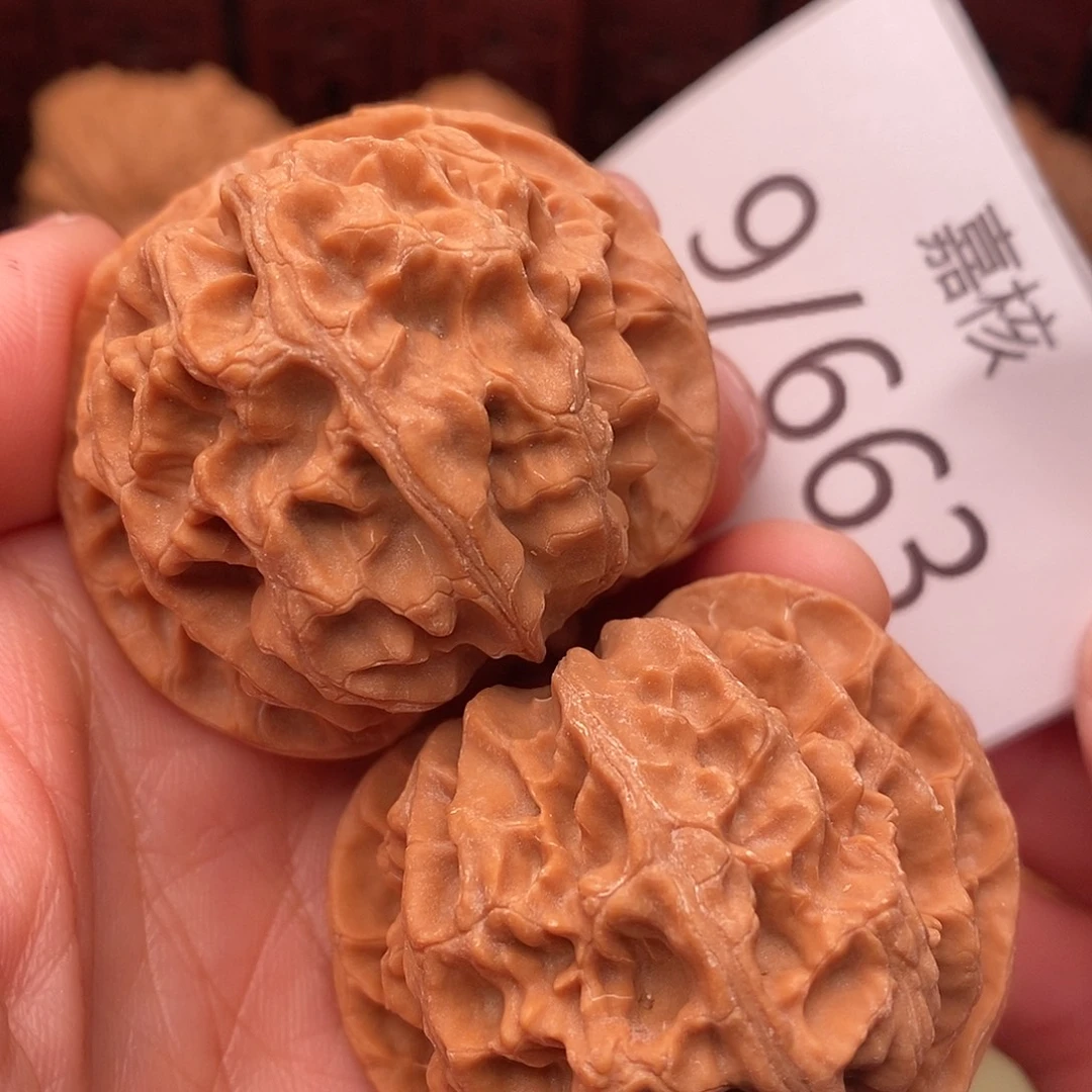 秋***"把件文玩核桃44苹果园