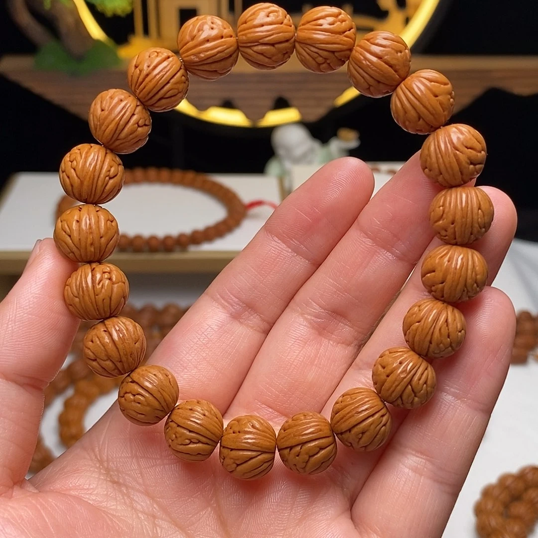 桃核手串11mm野生金麒麟桃核手串