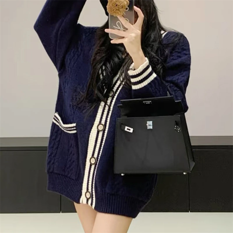 100纯羊毛女士拼色V领带兜开衫