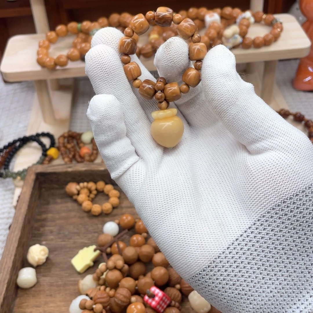 库克吊坠m****f库克手捻