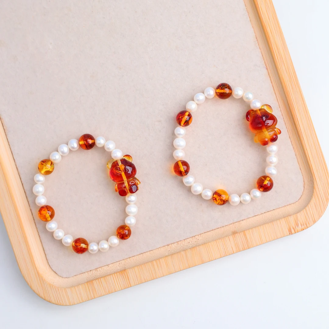 【琪琪珠宝】精致珍珠蜜蜡小熊手串——多样性发货发其一