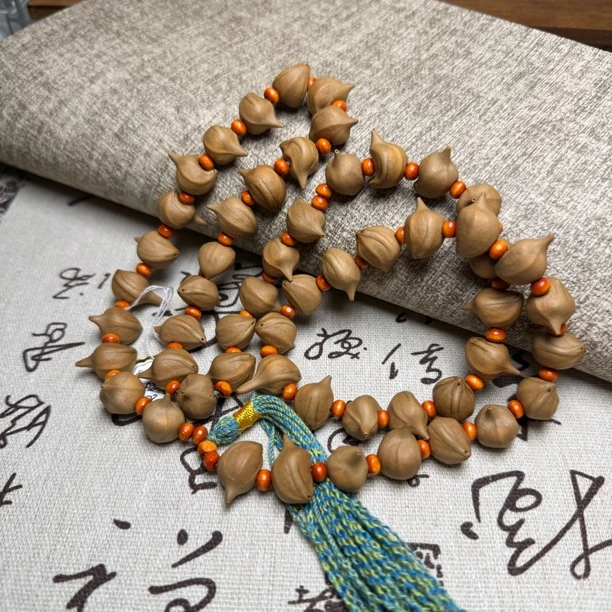 橄榄核铁核小元宝脖挂1.2