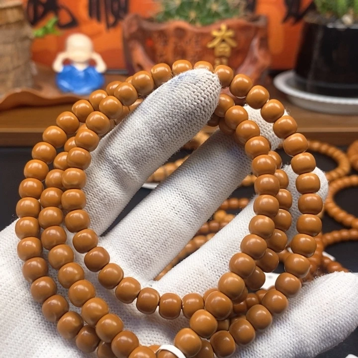 8***-吊坠橄榄核6.9老挝核尖极限弧108微漏白保真