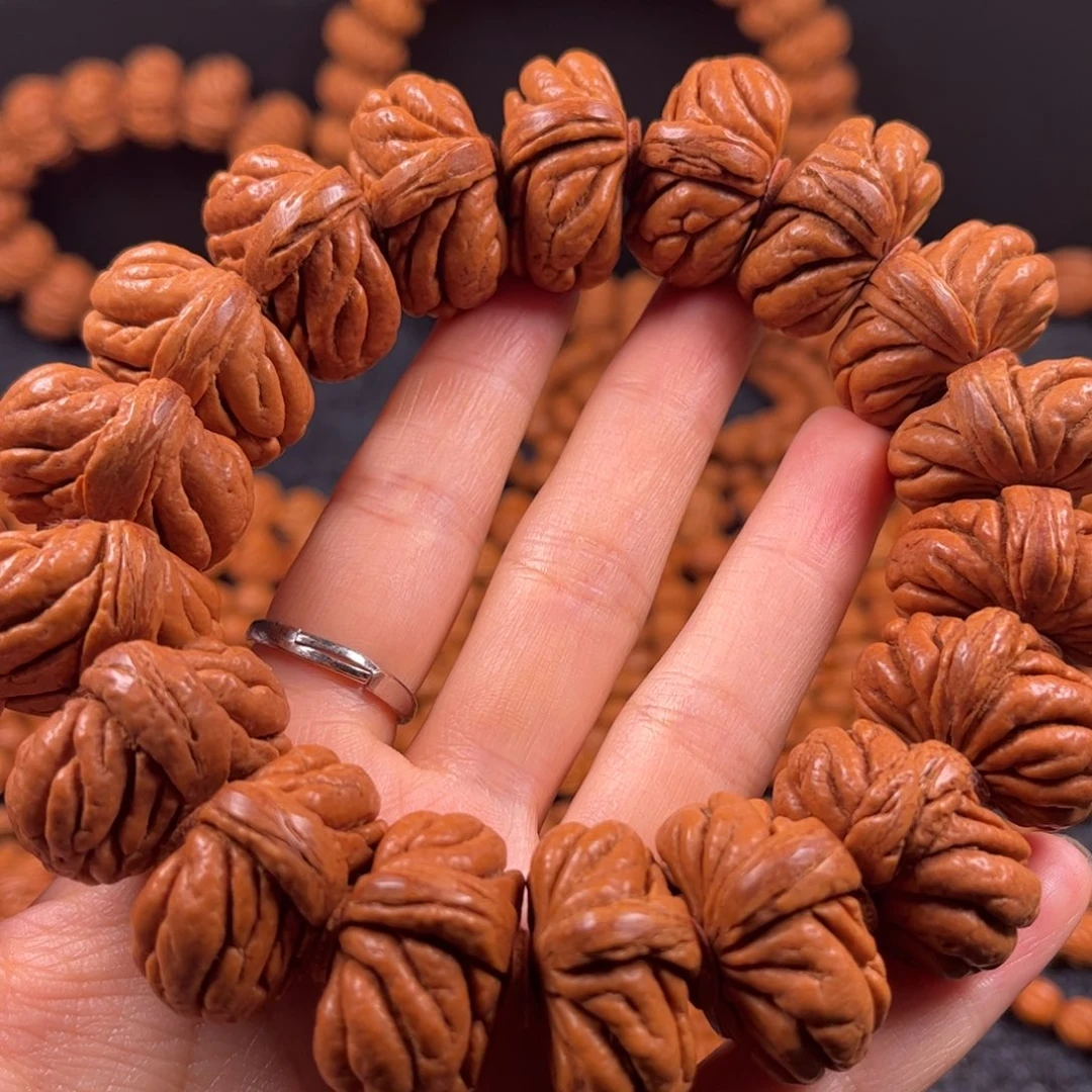 闲***适桃核手串A16链接手串