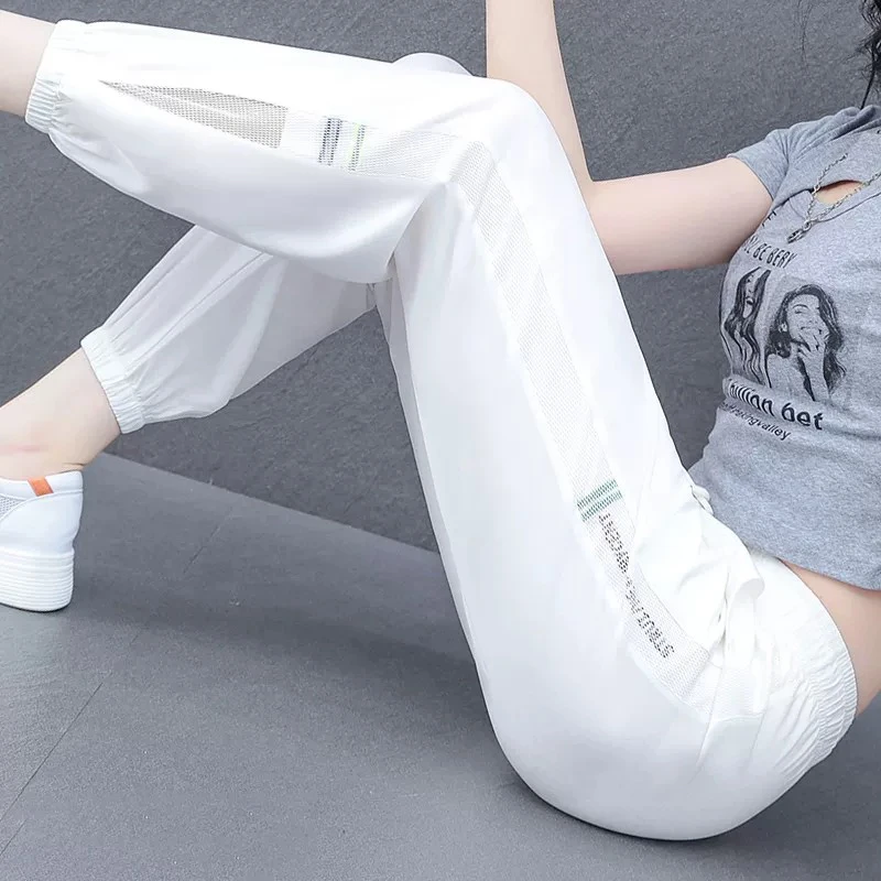 女士夏季新款运动宽松洋气涂鸦印花裤子