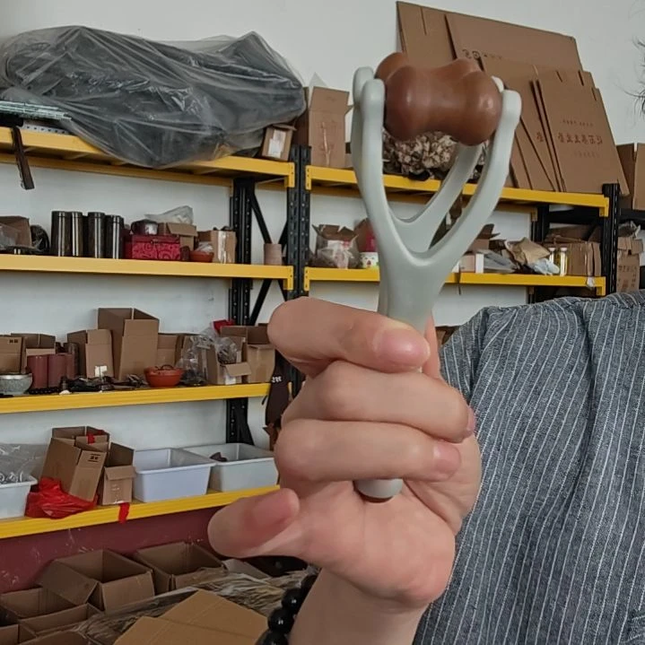 泗水砭石文化馆手指按摩器手把件