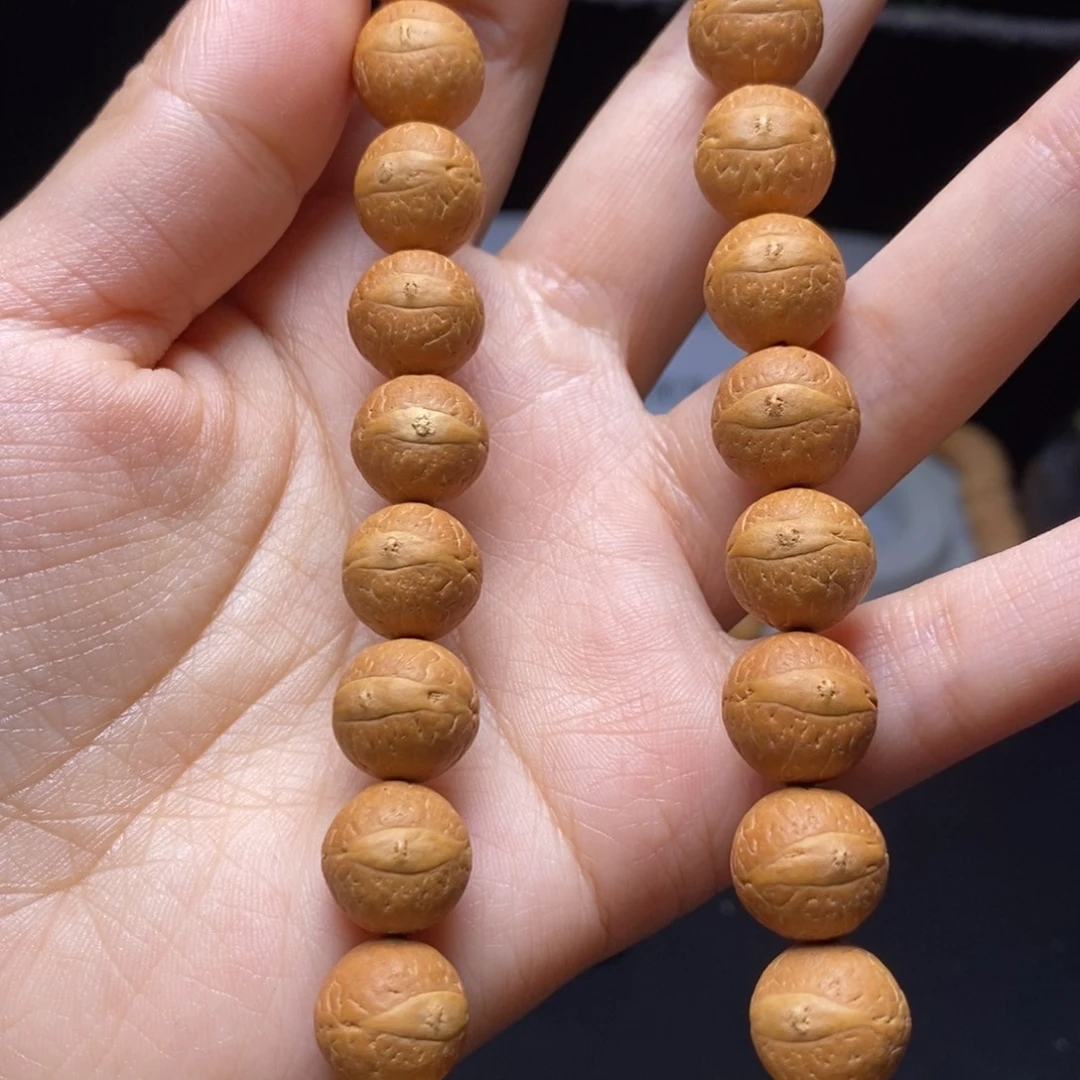 凤眼菩提吊坠12.5手持