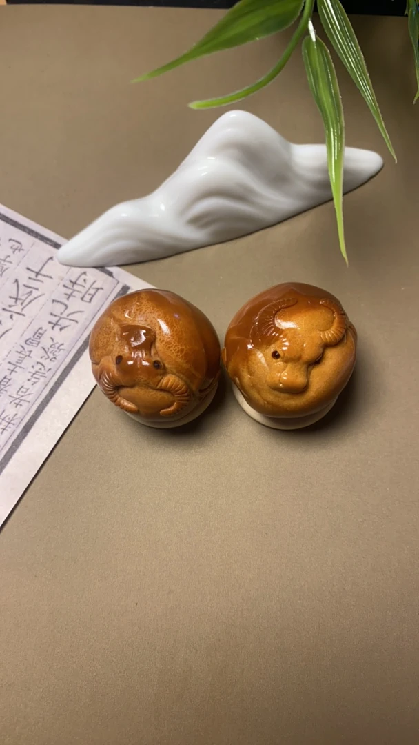 巴西橄榄牛转乾坤转运牛手把件通尺牛