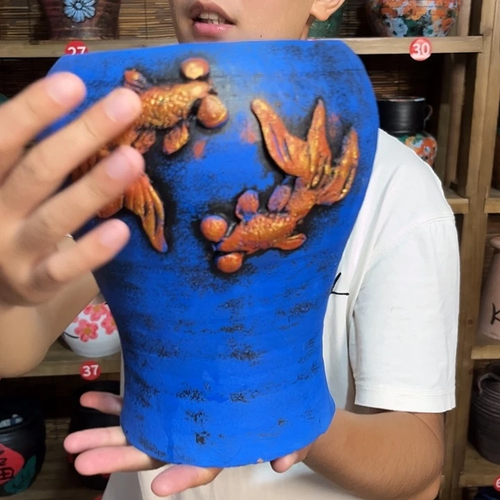红陶浮雕花盆炸炸炸