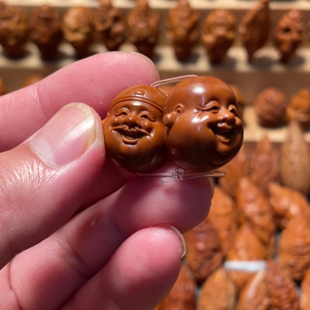 橄榄核吊坠财迷头