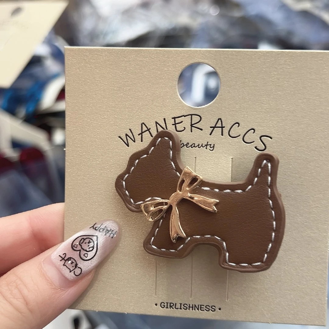 皮质铁合金咖色小狗鸭夹