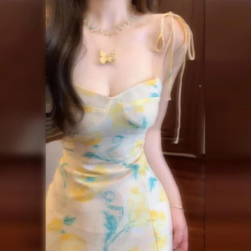 dhini法式黄色碎花吊带连衣裙子女夏季2025新款设计感辣妹修身开