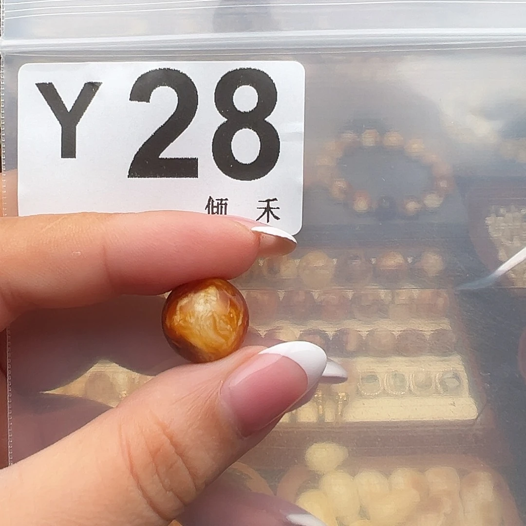 柠***，裸石琥珀未镶嵌圆珠14