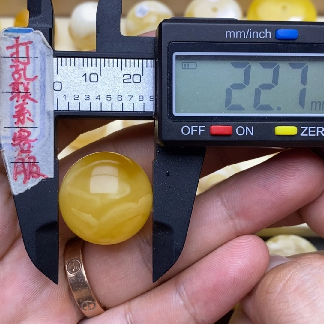 未镶嵌蜜蜡裸石22.7微瑕圆珠默认直发
