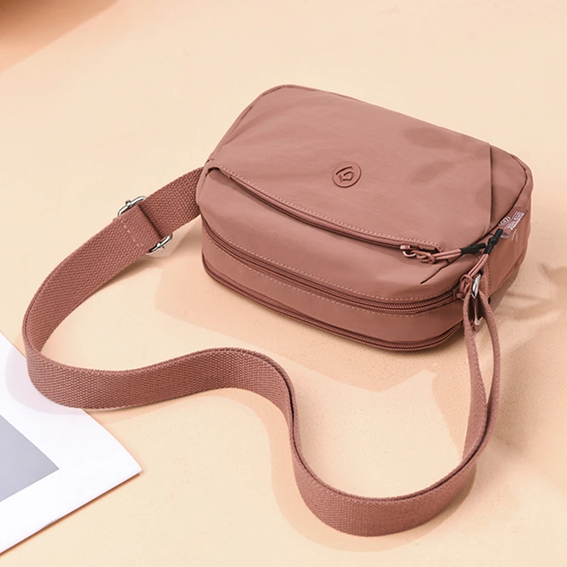 时尚多层斜挎包女简约韩版防水背包尼龙小巧女式单肩牛津布小包包